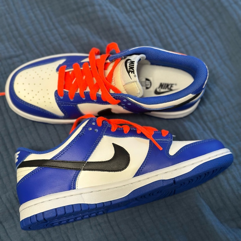 Nike White and Blue Sneakers with orange Accents - Picture 3 of 3